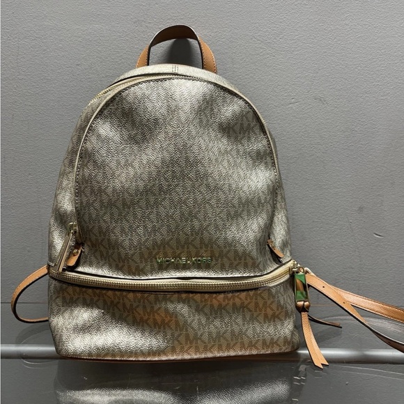 Michael Kors Handbags - Michael Kors Silver and Tan Backpack